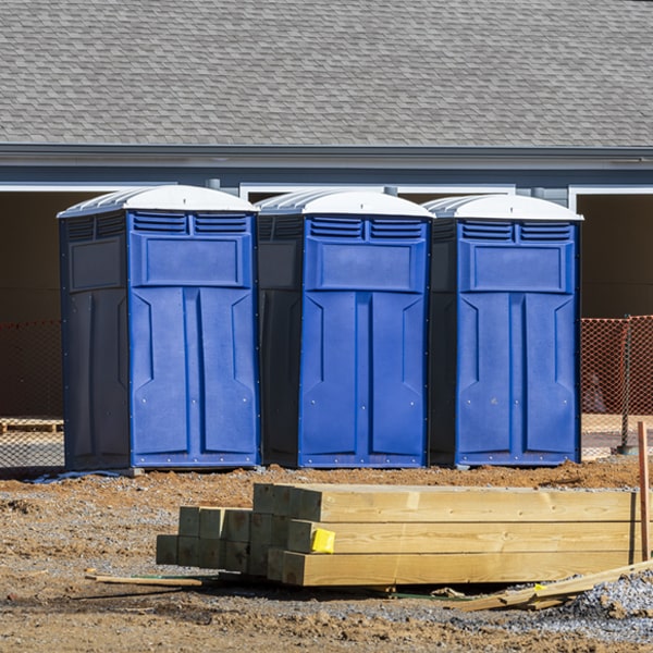 what is the cost difference between standard and deluxe portable toilet rentals in Pekin Illinois